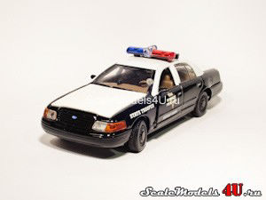 Масштабная модель автомобиля Ford Crown Victoria Texas State Police (2000) фирмы Gearbox.