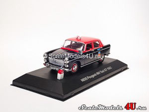Scale model of Peugeot 404 Taxi G7 (1962) produced by Nostalgie (Ixo).