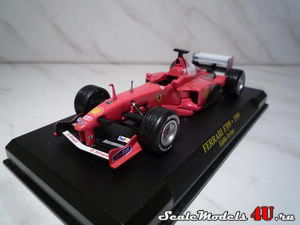 Масштабная модель автомобиля Ferrari F399 Eddie Irvine (1999) фирмы Fabbri (Ixo).