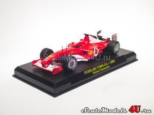 Масштабная модель автомобиля Ferrari F2003-GA Michael Schumacher (2003) фирмы Fabbri (Ixo).