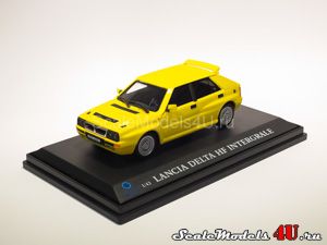 Масштабная модель автомобиля Lancia Delta HF Integrale (yellow) фирмы Hongwell/Cararama.